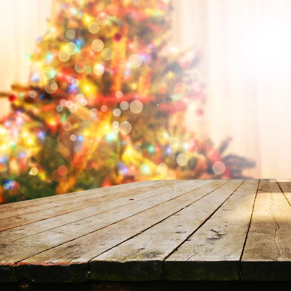 Empty table  with blurred Christmas tree — Stock Photo, Image