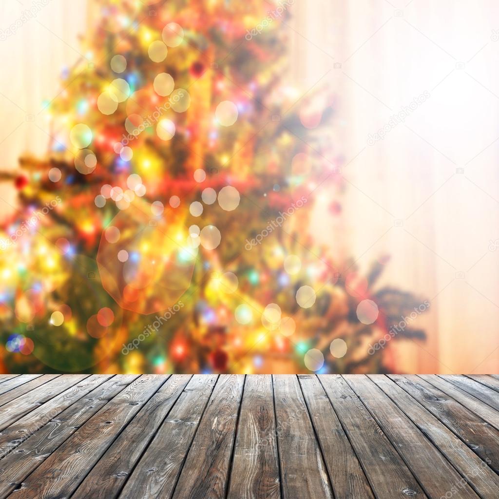 Empty table  with blurred Christmas tree