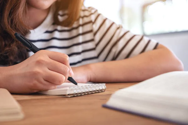 Closeup Image Woman Writing Blank Notebook Books Wooden Table While Royalty Free Stock Images