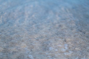 Tropikal beyaz plajdaki kumun yakın görüntüsü 