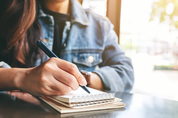 Closeup Image Woman Writing Blank Notebook Table — Stock Photo, Image