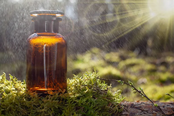 Old pharmacy bottle, natural herbal medicine - selective focus.