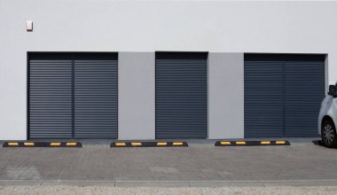 Şirket merkezinin önündeki otoparka araba durdurucu yerleştirildi. Park Limiter 'ını Durdur