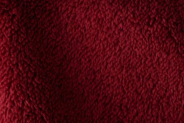 Koyu kırmızı sahte kürk dokusu arkaplanı