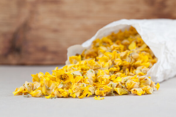 Dry mullein flowers in a paper bag