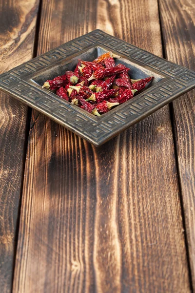 Dried chilies in a bowl — Stock Photo, Image