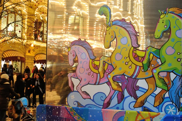 Drawn horse, illumination and people walking befor New Year — Stock Photo, Image