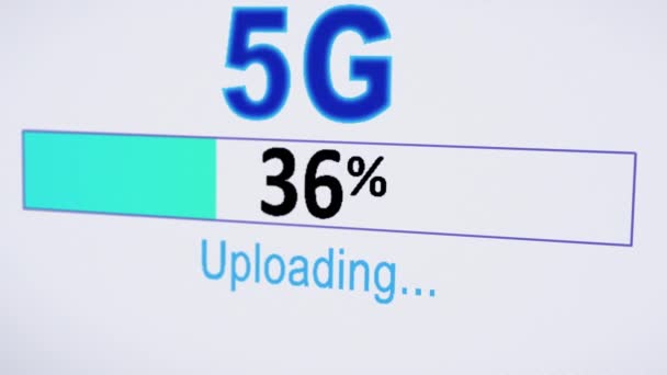 Uploading files in 5G fast speed on Computer Screen. Selective focus and screen pixel effect — Stock Video