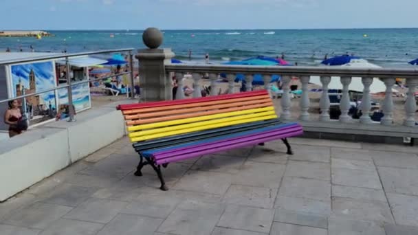 Rainbow pad on on Sitges Beach, Spanyolország. — Stock videók