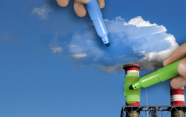 Bir bacadan mavi ve yeşil kirliliği boyayan eller