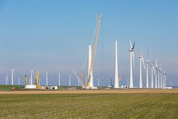 Construction site of new big Dutch wind farm in agricultural landscape — Stock Photo, Image