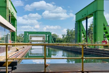 Iron construction of boatlift near German magdeburg with footpath clipart