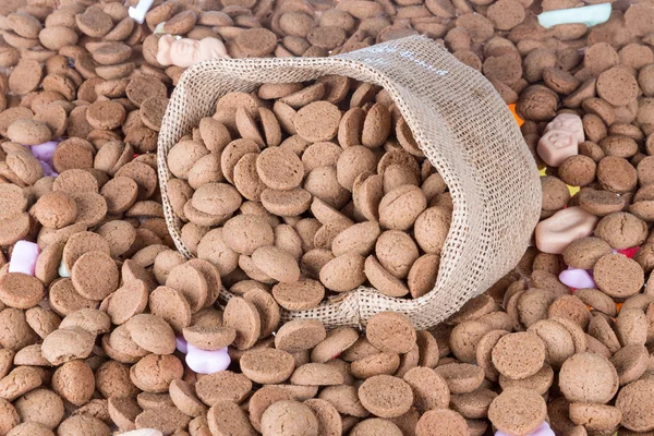 Background of ginger nuts and a jute bag — Stock Photo, Image