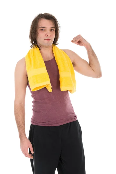 Hombre en ropa deportiva mostrando sus músculos, aislado en blanco — Foto de Stock