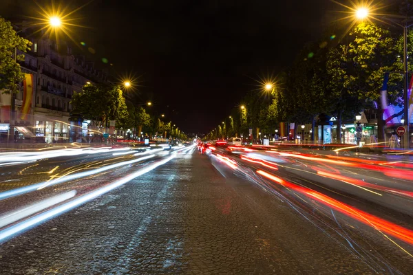 Evening streetview with illumination and traffic of Paris Champs Elysees — Stock Photo, Image