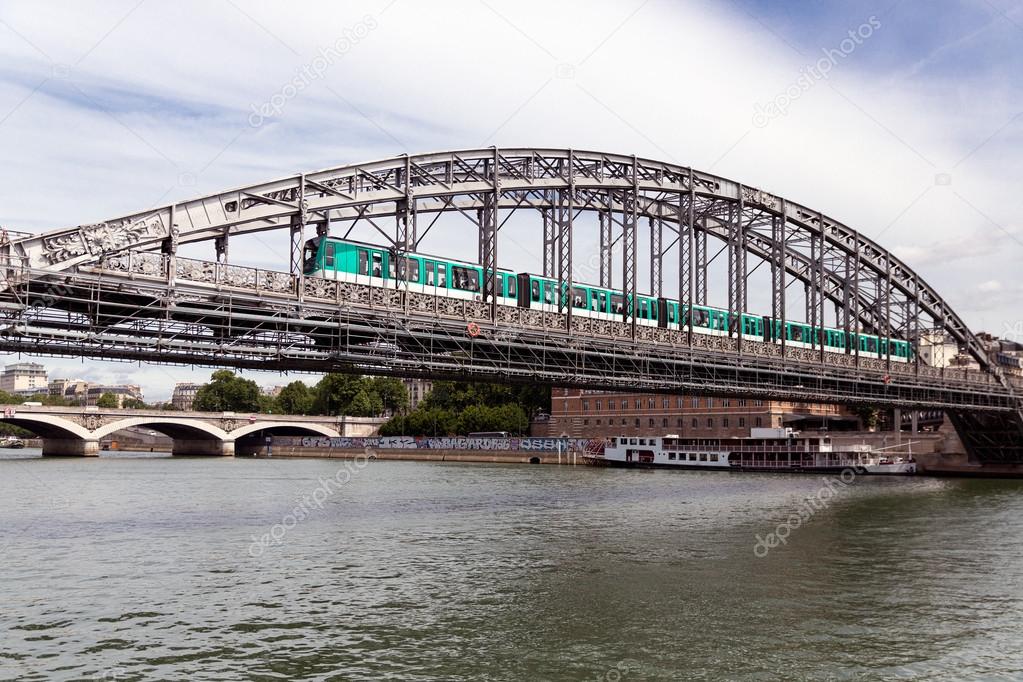 Bridge over river Seine in Paris with subway passing