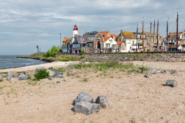 Village scene form beach of Urk, old Dutch fishing village clipart