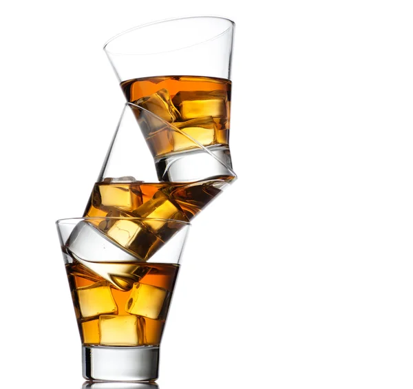 Three glasses of whiskey on the rocks — Stock Photo, Image