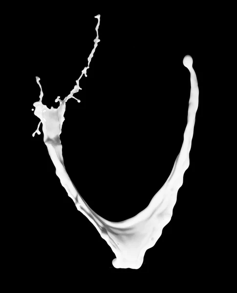 Milk or white liquid splash isolated on black background — Stock Photo, Image