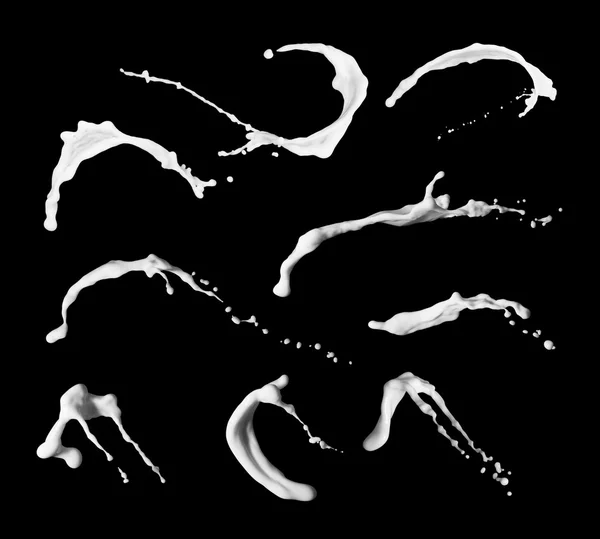 Milk splash collection, isolated on black background — Stock Photo, Image
