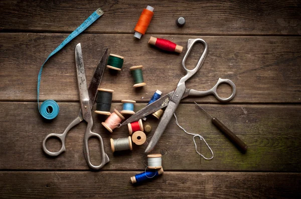 Vintage Background with sewing tools and colored tape. Sewing kit — Stock Photo, Image