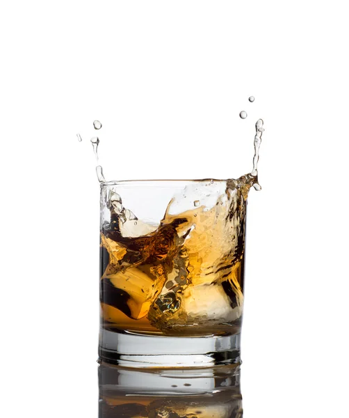 Whisky splash isolated on a white – stockfoto