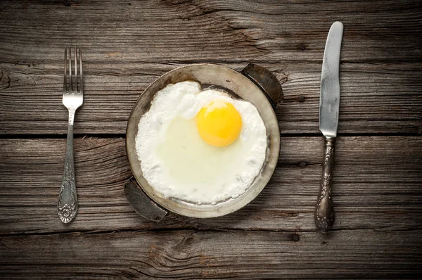 Fried egg on a pan served — Stock Photo, Image