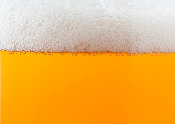 Sfondo di birra leggera con schiuma — Foto Stock