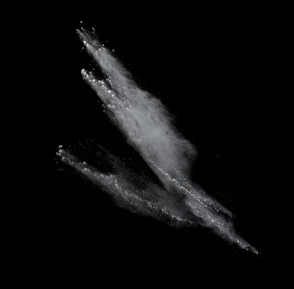 Zamrożenie ruchu kurzu kolorowe wybuchu na białym tle na czarnym tle — Zdjęcie stockowe