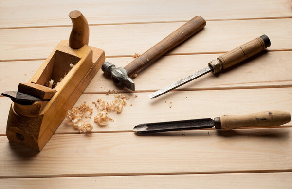 joinery tools on wood table background with business card