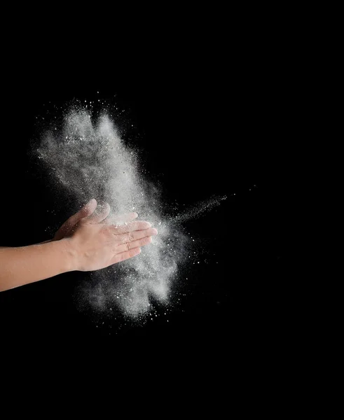 Zmrazení pohybu výbuchu prachu v rukou — Stock fotografie