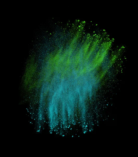 Красочный порошковый всплеск на черном фоне — стоковое фото