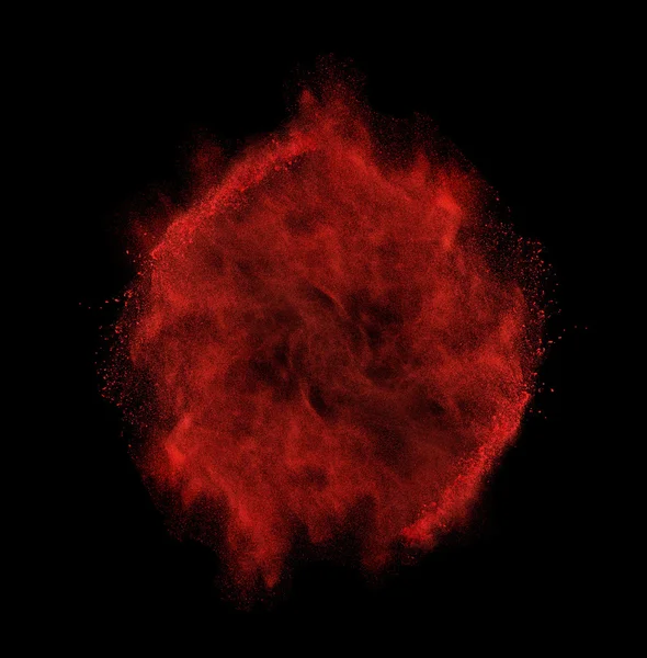 Zamrożenie ruchu wybuchu pyłu czerwony na białym tle na czarnym tle — Zdjęcie stockowe