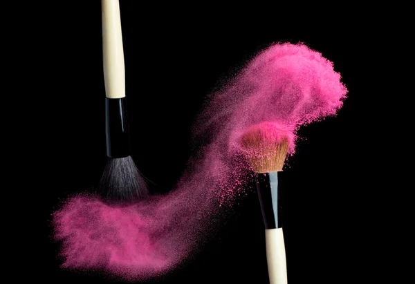 Make up brush with pink  powder  isolated on black — Stock Photo, Image