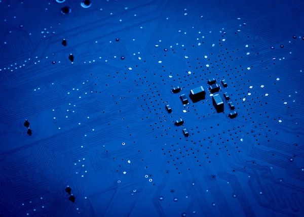 Blue circuit board background of computer motherboard — Stock Photo, Image