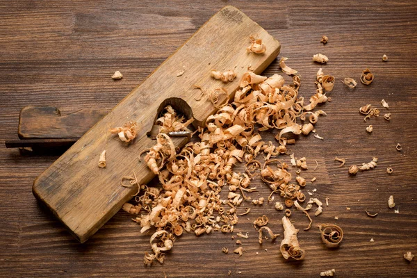 Old vintage carpenter jointer tool on wooden table — Stock Photo, Image