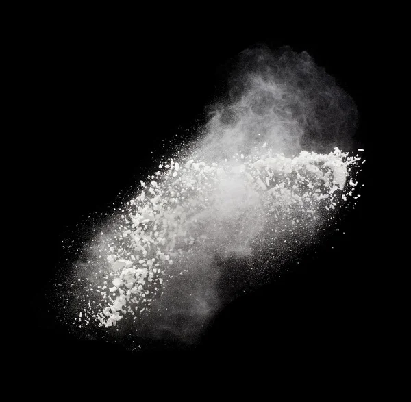 Figer le mouvement de l'explosion de poudre blanche, isolée sur fond noir. Dessin abstrait du nuage de poussière blanche. Économiseur d'écran explosion particules, papier peint avec l'espace de la copie. Concept de création de planète — Photo