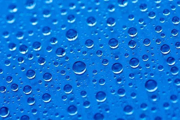 Gouttes d'eau bleue fond — Photo