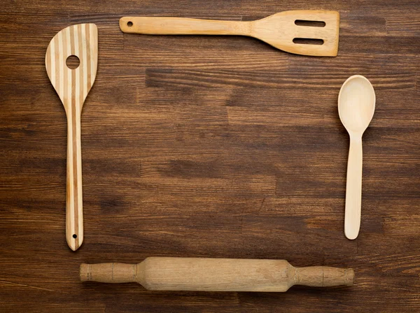 Ξύλινο κουζίνα εργαλεία σε εκλεκτής ποιότητας ξύλινα φόντο. Κάτοψη — Φωτογραφία Αρχείου