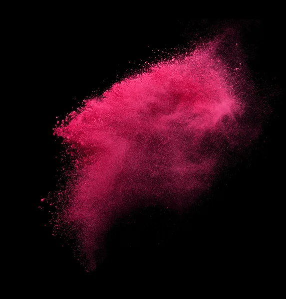 Esplosione di polvere rossa isolata su nero — Foto Stock