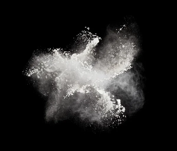 Freeze motion of white powder exploding, isolated on black. Abstract design of white dust cloud. Particles explosion screen saver, wallpaper with copy space. Planet creation concept — Stock Photo, Image