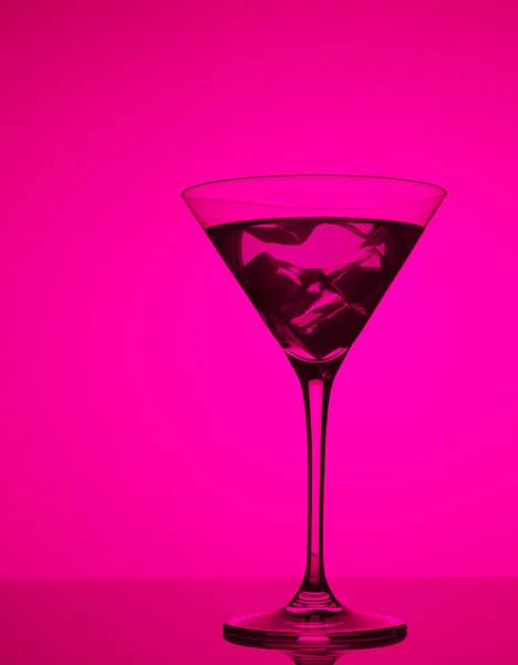 Colourful coctail with ice on the pink background — Stock Photo, Image