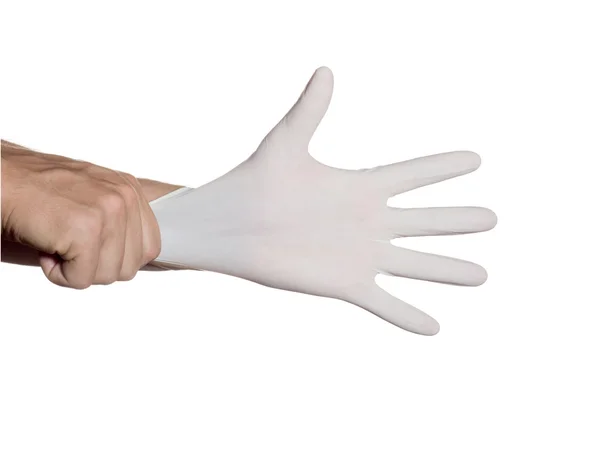 Médico vestido de guantes en las manos para la protección y cuidado para los pacientes. — Foto de Stock