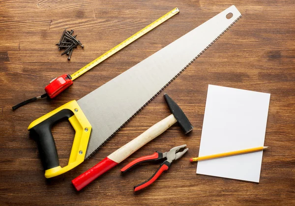 Joinery tools on wood table background with note book and copy space — Stock Photo, Image
