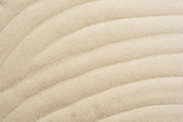 Closeup of sand pattern on a beach in the summer — Stock Photo, Image