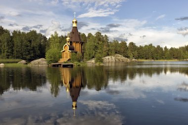Russia. The Church of St. Andrew on the river Vuoksa. clipart