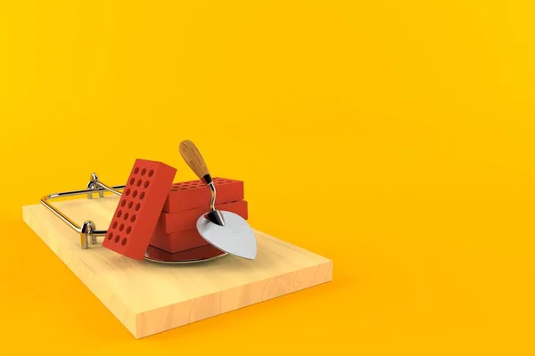 オレンジ色の背景に独立したマウストラップ付きのトロエルとレンガ 3Dイラスト — ストック写真