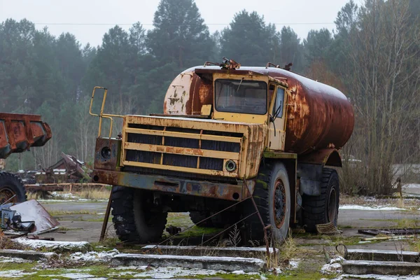 a giant truck with a tank that took part in the liquidation of the Chernobyl accident on the territory of the former vehicle fleet of the abandoned city of Pripyat