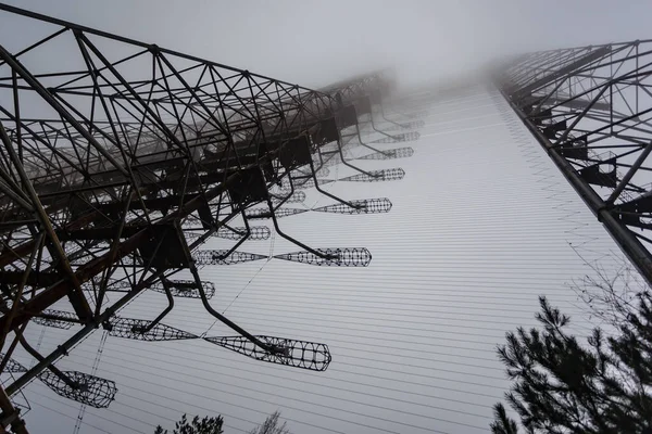 Soviet radar Duga in foggy weather. Russian woodpecker - over-the-horizon radar station near Chernobyl