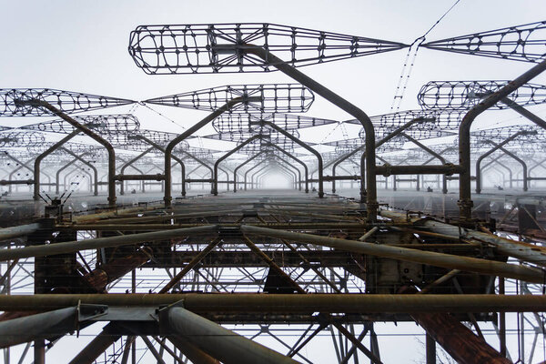 Soviet radar Duga in foggy weather. Russian woodpecker - over-the-horizon radar station near Chernobyl